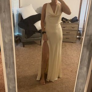 Floor length cow neck custom gown with slit